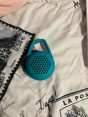 Compact Teal Clip-On Bluetooth Speaker